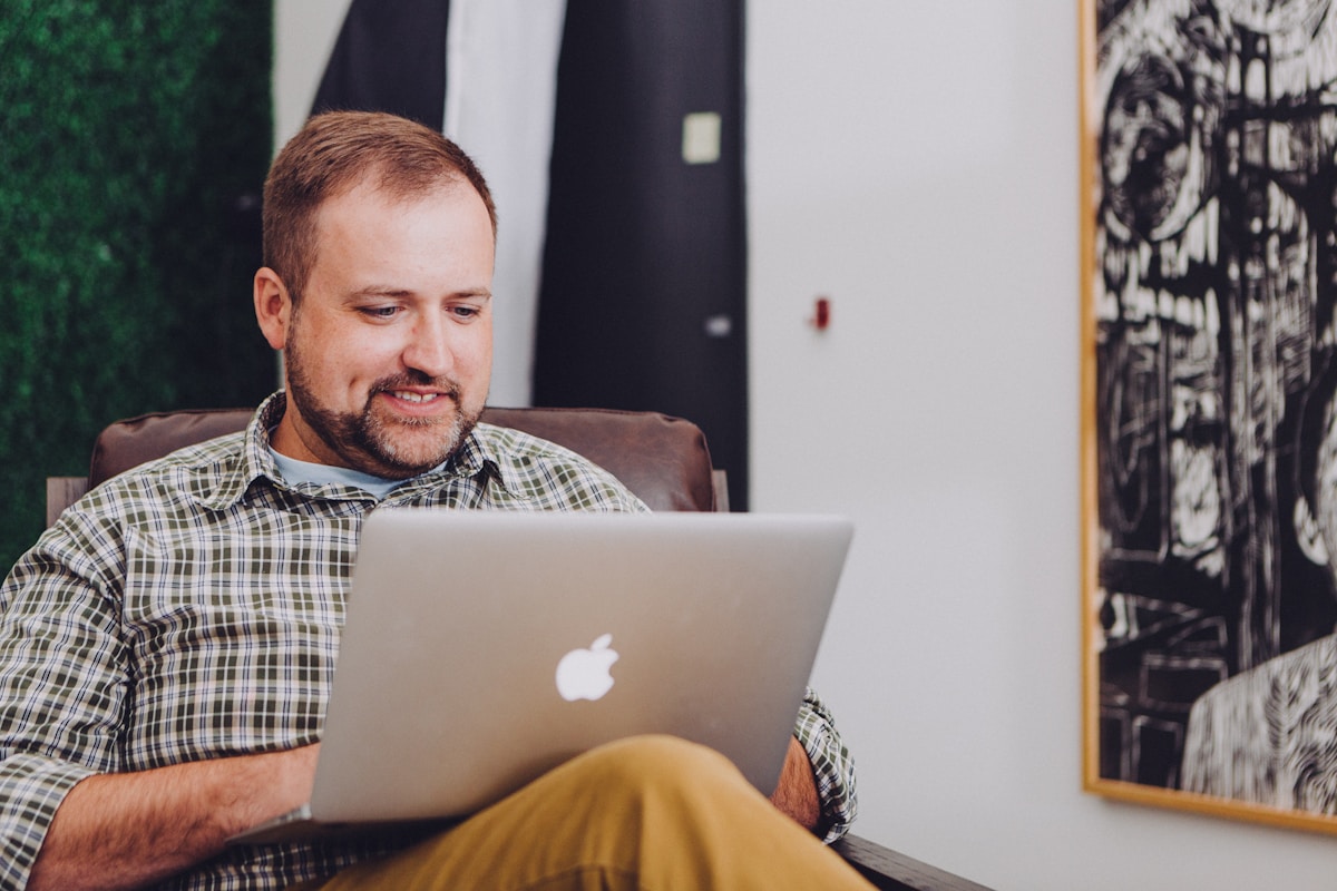 Investor reviewing real estate opportunities on a laptop